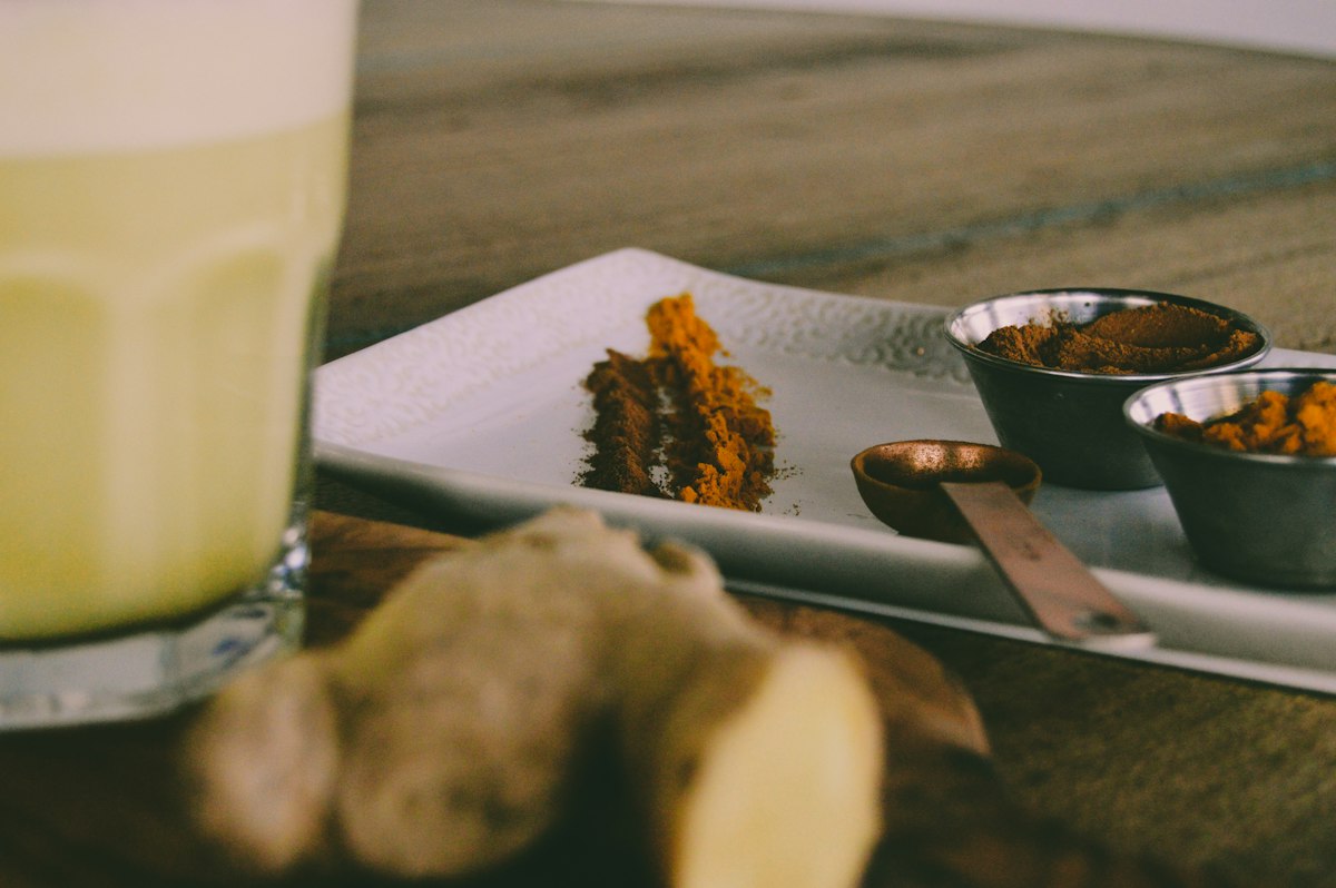 Homemade herbal drinks in glass cups with fresh herbs